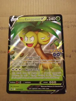 ALOLAN EXEGGUTOR V JUMBO SWSH225 Black Star Promo Pokemon GO - Image 1