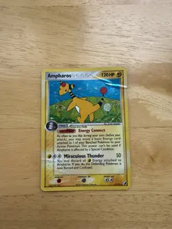 2005 Pokemon Ampharos 1/115 Unseen Forces Holo- DMG - Image 1