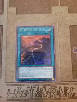YUGIOH FIRE FORTRESS ATOP LIANG PEAK FIGA-EN018 SECRET 1ST ED NM - Image 1