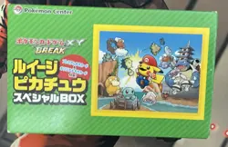 Sealed Luigi Pokemon Center Poncho Box - Mario Pokemon - Opened Sleeves Inside! - Image 1