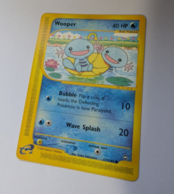 Wooper 117/147 Aquapolis English Common Regular e-Reader 40 HP - Image 1