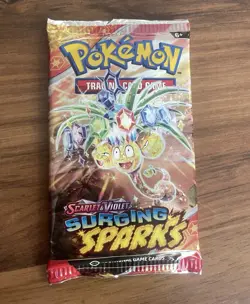 The Pokemon Company Intl Pokemon TCG Surging Sparks Booster Pack, 10 Cards EN - Image 1