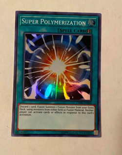 Yugioh SUPER POLYMERIZATION - OP09-EN009 - OTS Tournament Pack 9 Super Rare MINT - Image 1