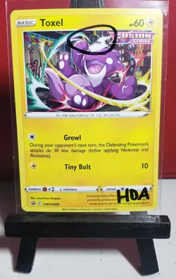 HD SWIRL Toxel SWSH209 Cosmos Holo Rare Sword & Shield Pokemon Card HDA - Image 1