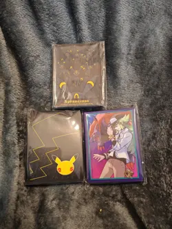Official Pokemon Card Sleeves - inc. Chinese Exclusive Umbreon & Celebrations - Image 1
