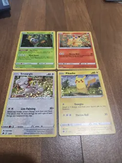 Lot Of 4 McDonald's 2022 Pokemon Promo Cards (Pikachu 7/15, Rowlet, Victini) - Image 1