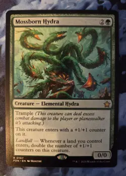Mossborn Hydra | Foundations FDN | R0107 Regular NM MTG Magic the Gathering - Image 1