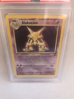 PSA 7 Pokemon WOTC 2000 Base Set 2 Alakazam 1/130 Holo Rare Card NM - Image 2