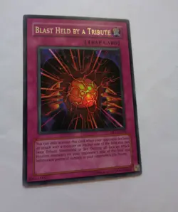 Blast Held By A Tribute DR1-EN266 ( Ultra Rare, Unlimited, Lightly Played / LP) - Image 1
