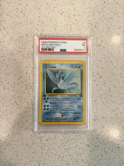 1999 POKEMON FOSSIL 2 ARTICUNO-HOLO 1ST EDITION - PSA 7 - Image 1