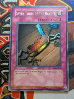Yugioh - Seven Tools of the Bandit DB2-EN075 Super Rare - LP - Image 1