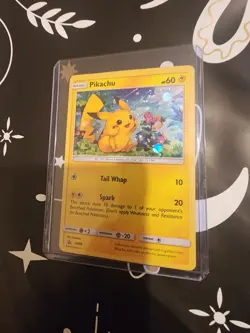 Pokemon TCG Pokemon Pikachu Black Star Promo SM86 Cosmos Holo Flawed - Image 1