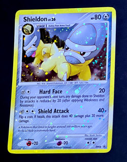 2007 Pokemon SHIELDON Black Star Promo COSMOS HOLO Bleed Error Card #DP08 SWIRL - Image 1