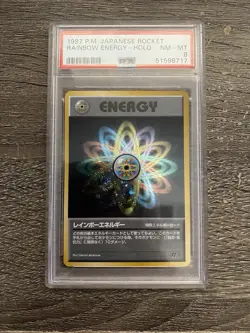 1997 Pokemon Japanese Rocket Rainbow Energy Holo PSA WITH SWIRL ON 3rd slide - Image 1