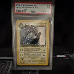 PSA 7 2000 Pokemon Team Rocket Dark Magneton 11/82 1st Edition Holo EN - Image 1