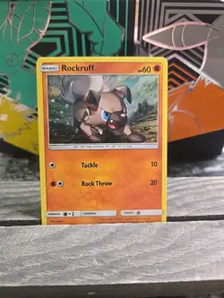 Pokemon TCG Sun & Moon Rockruff SM06 Black Star Promo Cosmos Foil Swirl ! - Image 1