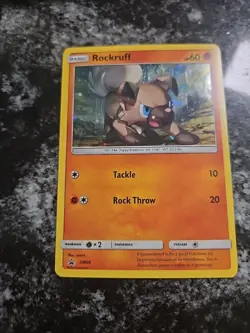 Pokemon TCG Sun & Moon Rockruff SM06 Black Star Promo Cosmos Foil Swirl ! - Image 2