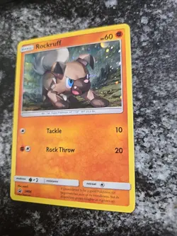 Pokemon TCG Sun & Moon Rockruff SM06 Black Star Promo Cosmos Foil Swirl ! - Image 3