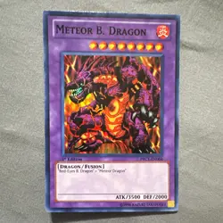 Konami Yu-Gi-Oh! Meteor B. Dragon PRC1-EN004 Super Rare Holo 1st Ed EN - Image 1