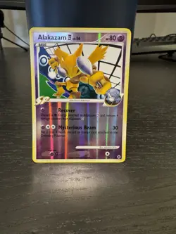 Alakazam E4 38/111 Rising Rivals Pokemon Card NM - Image 1
