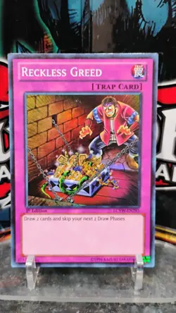 RECKLESS GREED Foil Holo YU-GI-OH 1st Edition Trading Card LCYW-EN285 - Image 1