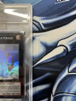 YuGiOh 2014 Bujinki Amaterasu PRIO-DE052 PGS 8.5 Ghost Rare 1st Edition - Image 2