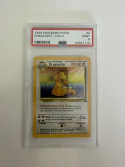 1999 POKEMON FOSSIL #4 DRAGONITE-HOLO PSA 9 - Image 1