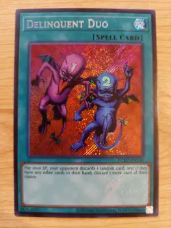 Delinquent Duo - LCKC-EN101 - Near Mint NM - Secret Rare - Unlimited - Image 1