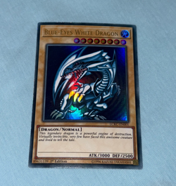 YuGiOh - Blue-Eyes White Dragon LCKC-EN001 1st Edition Near Mint (SDK Artwork) - Image 1