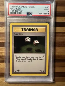 Pokemon 1999 Trainer Card Gambler 1st Edition Fossil 60/62 PSA 9 Mint - Image 1