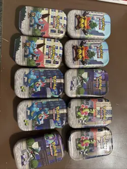 Lot of 10 Empty Pokemon TCG Mini Tins - Lumiose city with art & stickers - Image 1