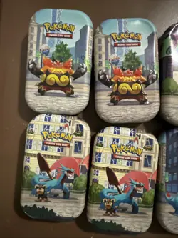 Lot of 10 Empty Pokemon TCG Mini Tins - Lumiose city with art & stickers - Image 4