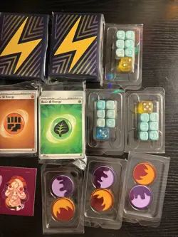 Pokemon TCG Lot of ETB Sleeves, Dice, Energy cards, coins, stickers - Image 3