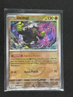 Okidogi Poke Ball Pattern 057/131 Prismatic Evolutions Holo Pokemon Card TCG NM - Image 1