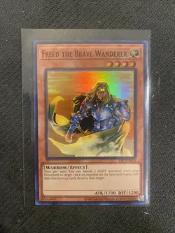 YUGIOH! 1-FREED THE BRAVE WANDERER-SUPER RARE-IOC-EN014-25TH ANNIVERSARY - Image 1
