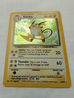 Pokemon Raichu 014/102 Base Set Holo Rare Unlimited - Uncirculated - Image 2