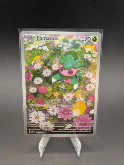 Fomantis 085/084 Me05: Pitch Black Pokemon NM 85 IR - Image 1