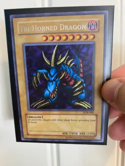 Yu-Gi-Oh! Tri-Horned Dragon LOB-000 Secret Rare Unlimited NM - Image 1