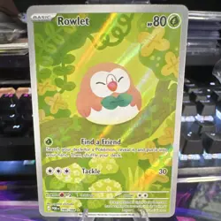 Nintendo Pokemon TCG Rowlet 090/088 Prismatic Evolutions Holo IR EN HP 80 - Image 1
