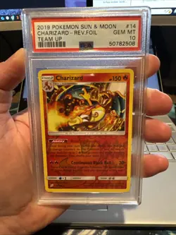 2019 POKEMON SUN & MOON TEAM UP #14 CHARIZARD-REVERSE FOIL PSA 10 - Image 1