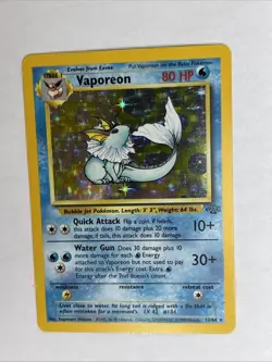 Vaporeon 12/64 Holo Rare Jungle Pokemon Card Vintage WOTC 1999 NM/LP - Image 1