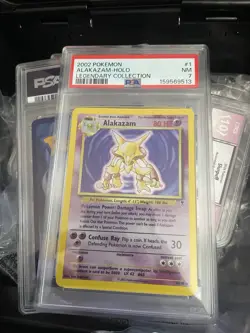 PSA 7 2002 Pokemon TCG Legendary Collection Alakazam Holo #1/110 - Image 1