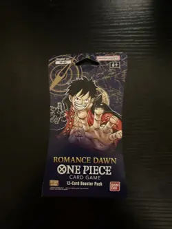 One Piece TCG Romance Dawn Booster Pack Card Game - 12 Cards per Pack 811039038229 - Image 1