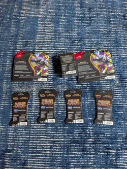 Pitch Black Pokemon Lot Of 2x Blister Packs, 1x Booster Bundle, and 4x Singles - Image 1