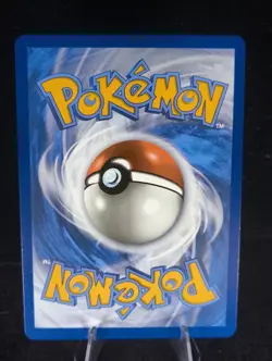 Team Rocket's Meowth Cosmos Holo 149/182 Destined Rivals Card - Image 2