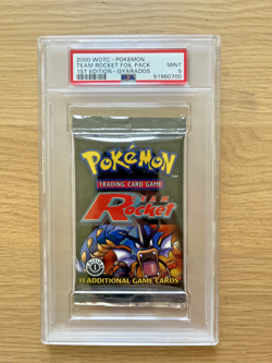 POKEMON | 1ST EDITION TEAM ROCKET 2000 | FOIL BOOSTER PACK GYARADOS| PSA 9 - Image 1