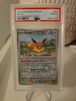 PSA 8 NM-MT Eevee 074/131 Pokemon Day 2025 Reverse Holo Pokemon TCG Card - Image 1