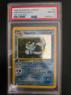 1999 Pokemon 1st Edition Jungle Vaporeon Holo #12 PSA 8 NM-MT - Image 1