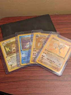 Pokemon 1999 English Holo 4-Card Lot Fossil Raichu, Lapras, Hitmonlee, Kabutops - Image 1