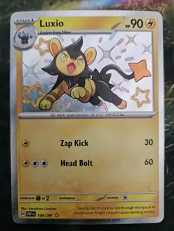 LUXIO - SHINY HOLO - PALDEAN FATES 136/091 - LIGHTLY PLAYED - POKEMON TCG 🇨🇦 - Image 1